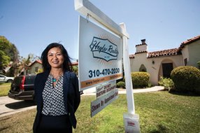Putting Out Welcome Mat: Heyler Realty co-owner Jae Wu at a Westside home listed for about $1.2 million.