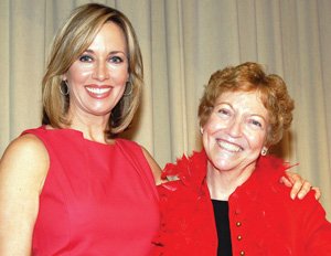 Barbara-Lee Edwards, left, and American Heart Association San Diego Division board member Susan Mahler share the stage at the Go Red for Women luncheon.