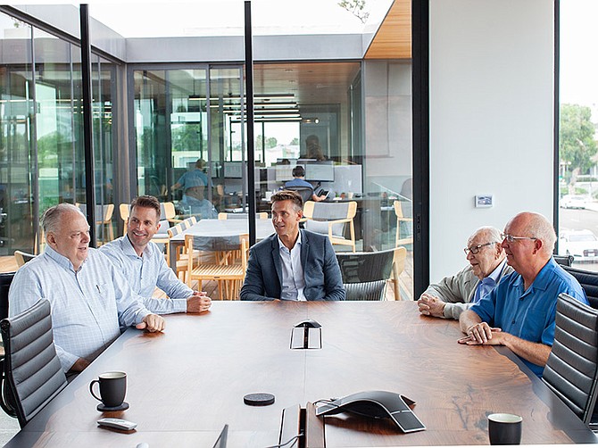C3bank’s Paul Becker (from left), Adam Moyer, Michael Persall, Evert Alsenz and Richard Skay meet at the bank’s Encinitas office.