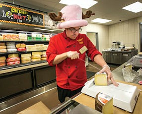 Wire Act: Jesse Cronkite at work at Murray’s Cheese in Sherman Oaks Ralphs.