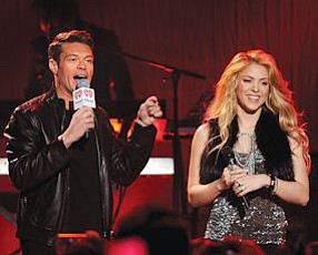 Star Studded: Host Ryan Seacrest with Shakira at Burbank iHeartRadio Theatre.