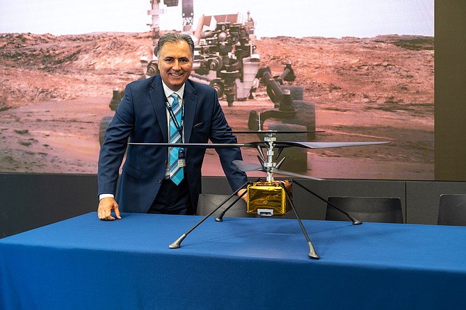   Wahid Nawabi, managing director of AeroVironment Inc., with a drone from Mars 