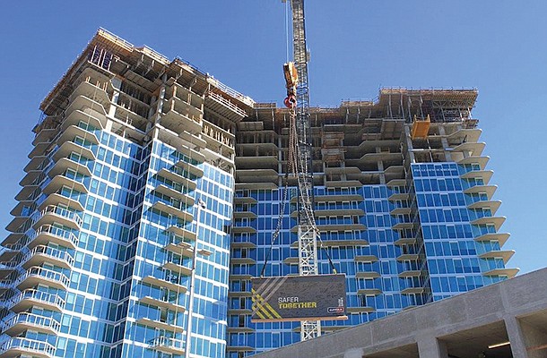 Construction of the Palisade apartment tower is progressing with apartments available for leasing in March or April. Photo courtesy of Suffolk