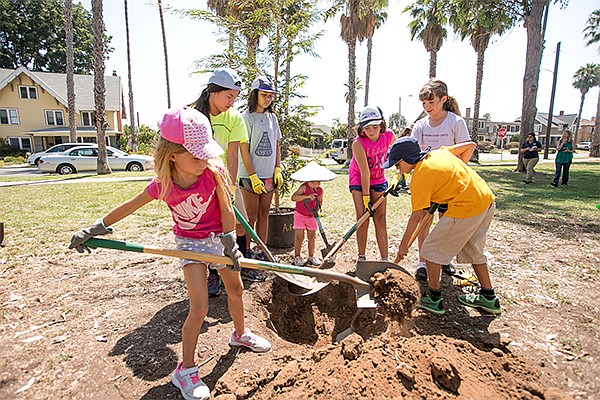 Volunteers work in Balboa Park as part of its Heart of the Community program. Photo courtesy of Balboa Park Conservancy