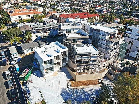 Photo shows a North Park apartment project under construction by Wright Real Estate Management and Development. Photo courtesy of Wright Real Estate Management and Development