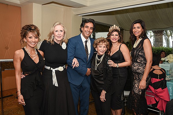 MJ Wittman, left, Miracle Circle co-chair; Wendy Walker; Dr. Sean Daneshmand, Miracle Babies co-founder; Dr. Edith Eger, Marjan Daneshmand, Miracle Babies co-founder and Elaine Becerra, Miracle Circle co-chair at the Breakfast at Tiffany’s event. Photo courtesy of Miracle Babies
