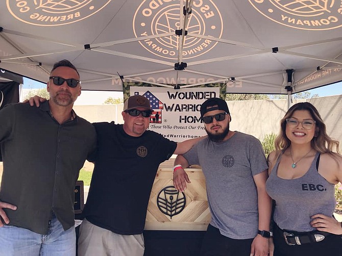 Tony Geist, left, Ketchen Smith, Jose Guillen and Liz Villa at the Escondido Brewing Co.’s event to benefit the Wounded Warrior Homes program. Photo courtesy of Escondido Brewing Co.
