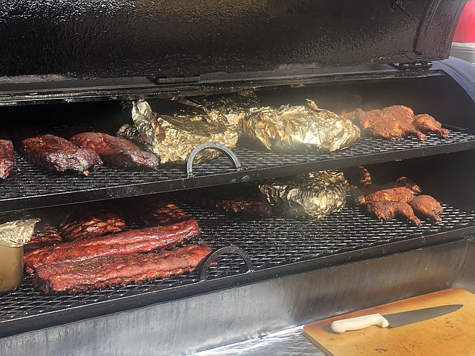 Smokin J’s BBQ has three smokers on trailers and, at its peak as a mobile business, would do two lunches and two dinners at four different locations via two trucks a day. Photo courtesy of Smokin J’s BBQ.