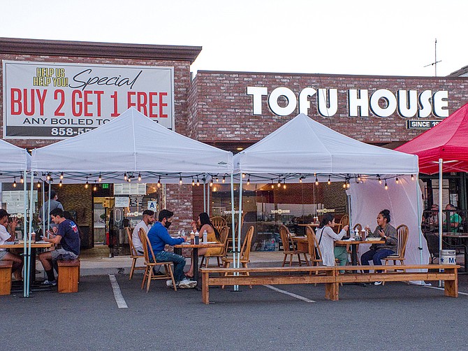 Tofu House’s Convoy location offers food for dine-in and take out with an expansive outdoor dining setup. Photo Courtesy of Tofu House.