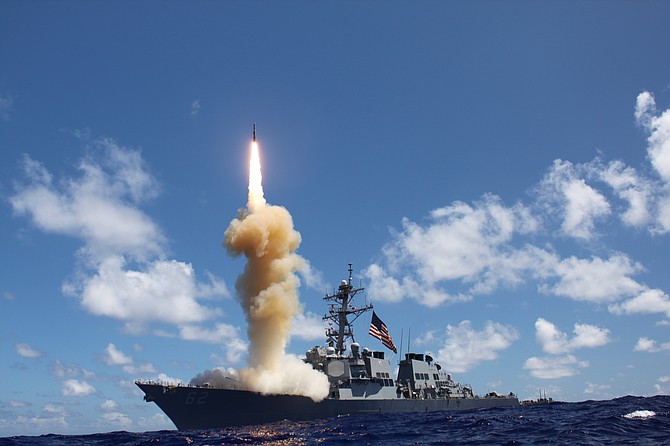 The guided missile destroyer USS Fitzgerald launches a Standard Missile-3 during a joint ballistic missile defense exercise in the Pacific Ocean during 2012. The U.S. Navy has awarded BAE Systems a contract for design work and support services for the vertical launch system, used by ships that carry missiles. Photo courtesy of U.S. Navy.