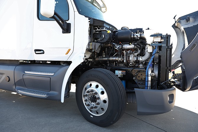 A big rig truck shows off its novel opposed-piston diesel engine developed by Sorrento Valley-based Achates Power. Photo courtesy of Achates Power.