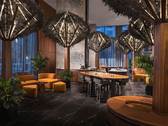 Photo courtesy of Jules Wilson Design Studio
Metal trees mimic a live forest in a downtown apartment complex
