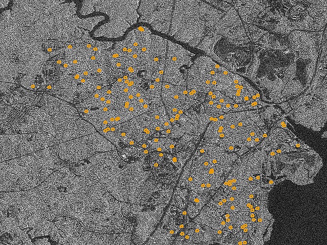 Rendering courtesy of Asterra
A satellite image of a city shows the likely leak locations identified with Asterra’s Recover leak detection algorithm in yellow, over a synthetic aperture radar image of the site. Asterra did not release the name of the city.