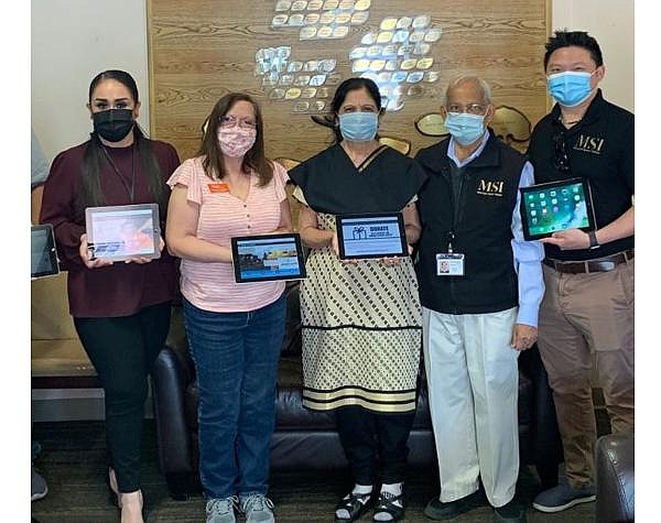 MSI partnered with Orange Senior Center to donate 100 refurbished iPads to adults 50 and older during the pandemic
