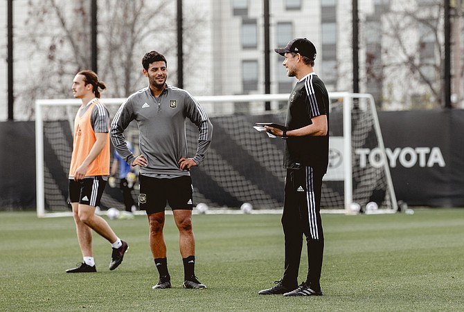 LAFC Performance Director Gavin Benjafield (right) with one of the team's players.