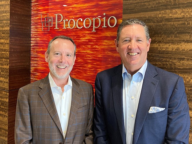 John Alessio (left) and Ken Weixel at Procopio’s Del Mar Heights office.