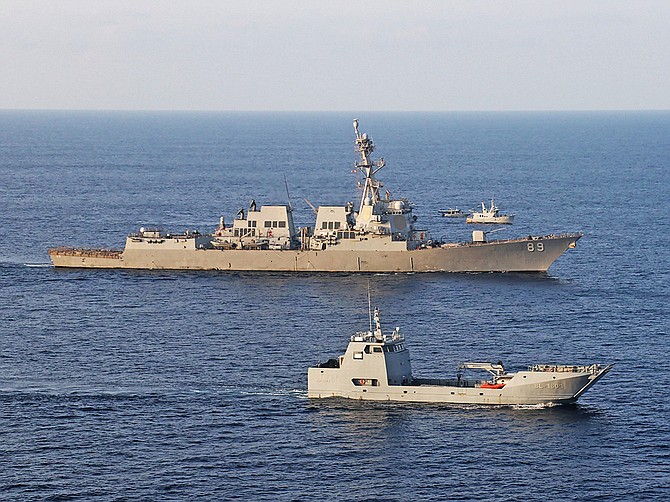 BAE Systems will oversee a mid-life modernization to the USS Mustin, commissioned in 2003. The destroyer is seen here in October with ships from Guatemala and El Salvador. (Photo courtesy of U.S. Navy)