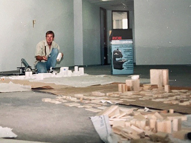 Joe Maak and his 1997 prototype of downtown San Diego, a model used by Center City Development Corporation to show how a coming ballpark (the precursor to Petco Park) would look. Maak was attending the New School of Architecture when he interned at Di Donato Associates, which was commissioned to build the model. Photo courtesy Joachim Maak