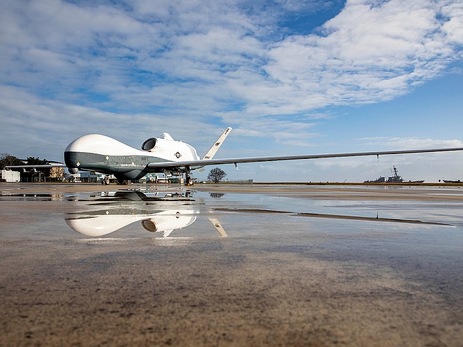 An MQ-4C Triton Unmanned Aircraft System sits on the flight line at Naval Station Mayport, Florida in December 2021. The Triton program is based in Rancho Bernardo. Photo courtesy of U.S. Navy