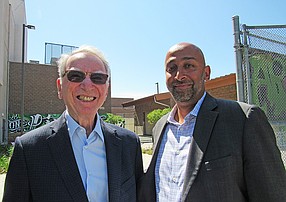 Irwin Jacobs, co-founder of Qualcomm, and Sidd Vivek, CEO of Junior Achievement of San Diego County, take a moment to pose at Lincoln High School after a cohort of juniors at the school are lauded for the JA Fellows Spring Semester Showcase. Photo by Karen Pearlman