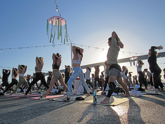 Participants at SOULSEAKER, an event that brought yoga to the Hornblower Inspiration the day before the summer solstice. Photo by Karen Pearlman