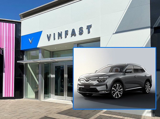 The entrance to the new VinFast showroom at Westfield UTC. The company plans to sell its VF8 electric SUV (inset) as well as other products there. Photo by Jeff Clemetson